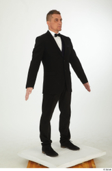 Steve Q black oxford shoes black trousers bow tie dressed smoking jacket smoking trousers standing whole body  jpg